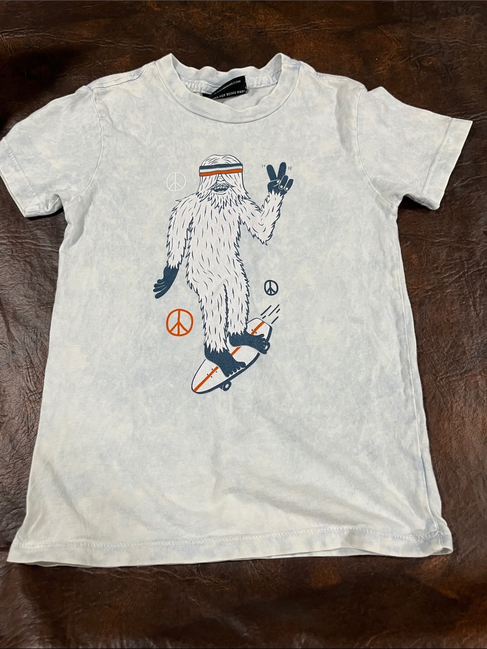 Kids White Graphic Tee with Skateboarding Yeti
